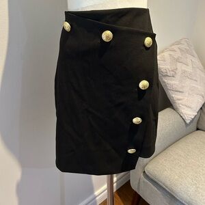 Express Women's Black Skirt with golden side buttons size 00